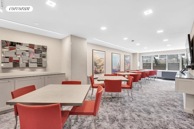 dining space with carpet, visible vents, and recessed lighting