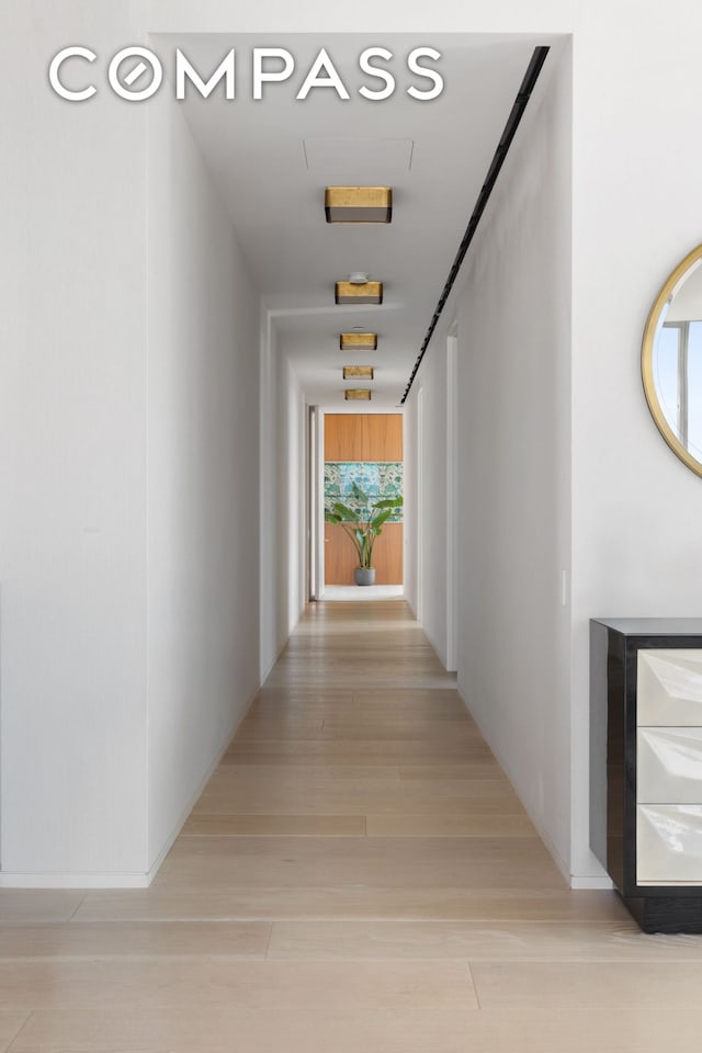 215 Chrystie St Unit Ph3, New York City, NY 10002 - corridor featuring light wood finished floors