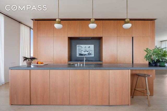 215 Chrystie St Unit Ph3, New York City, NY 10002 - kitchen with decorative light fixtures, modern cabinets, and a sink