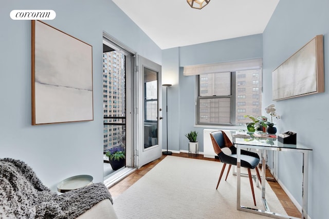 360 E 72nd St Unit B1008, New York City, NY 10021 - office area featuring wood finished floors and baseboards