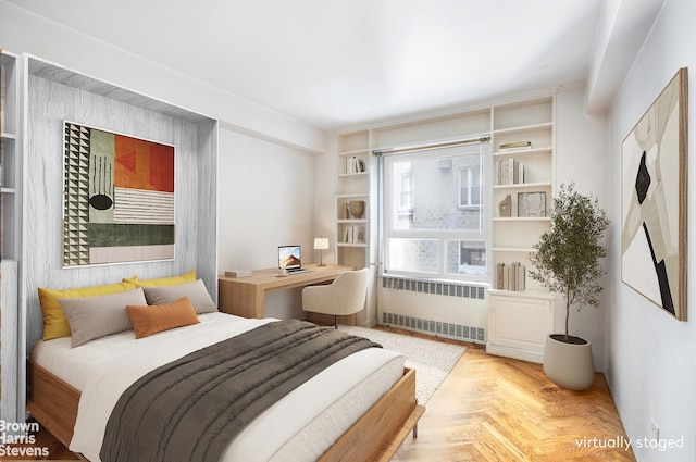 bedroom featuring radiator