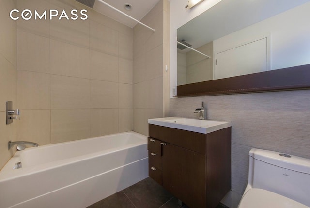 148 E 24th St Unit 4C, New York City, NY 10010 - full bath featuring tile patterned flooring, toilet, vanity, and shower / bathing tub combination