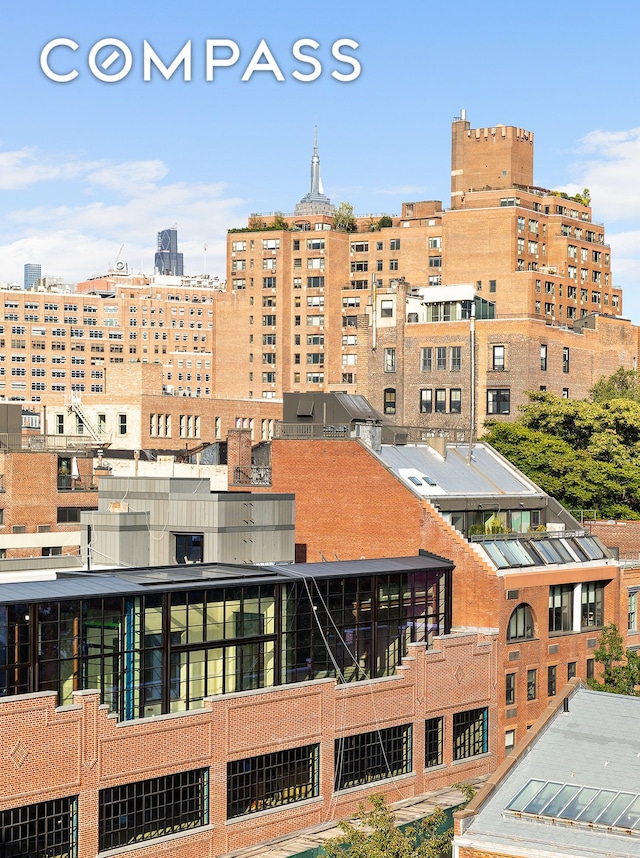 view of property with a view of city