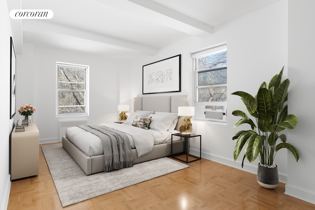 bedroom with radiator heating unit, beam ceiling, baseboards, and cooling unit