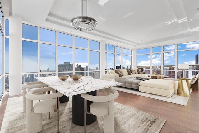sunroom / solarium featuring a view of city