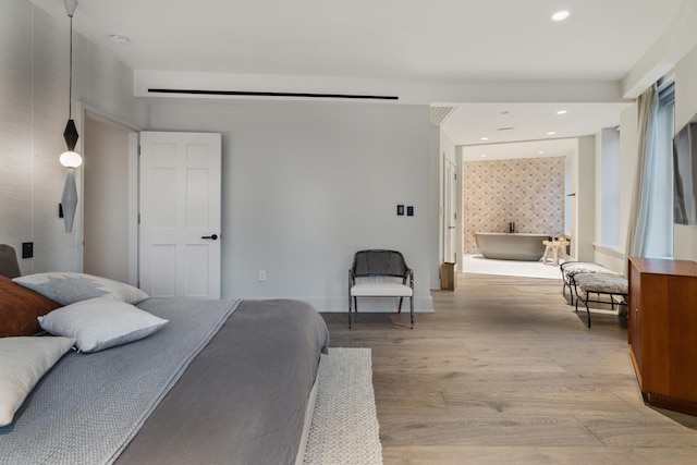 260 W Broadway Unit 9/10B, New York City, NY 10013 - bedroom featuring wood finished floors and recessed lighting