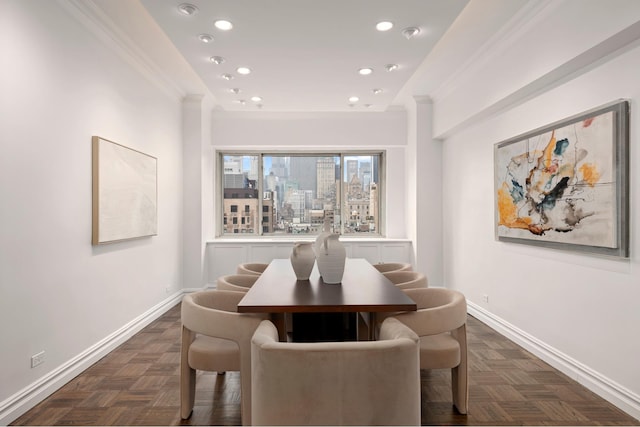 dining space featuring baseboards, recessed lighting, and crown molding