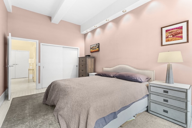 100 Hudson St Unit 4C, New York City, NY 10013 - bedroom featuring beamed ceiling and a closet