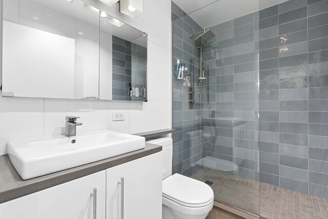 100 Hudson St Unit 4C, New York City, NY 10013 - full bathroom featuring a walk in shower, vanity, and toilet