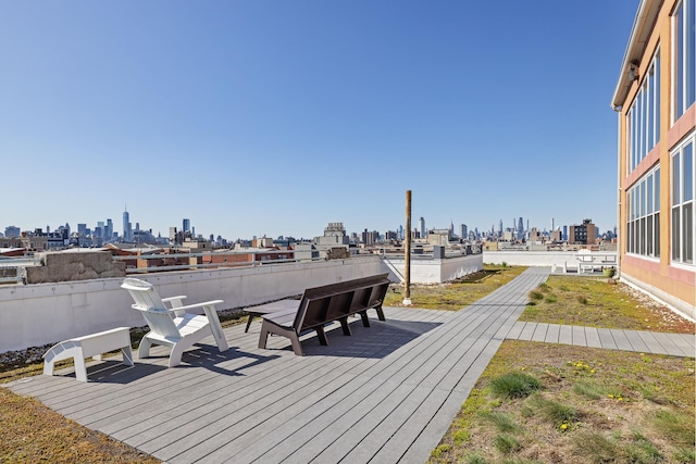 689 Myrtle Ave Unit 2E, New York City, NY 11205 - wooden deck featuring a view of skyline
