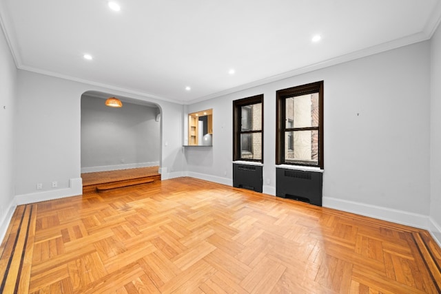 95 Park Ter E Unit 1D, New York City, NY 10034 - spare room with baseboards, arched walkways, and ornamental molding