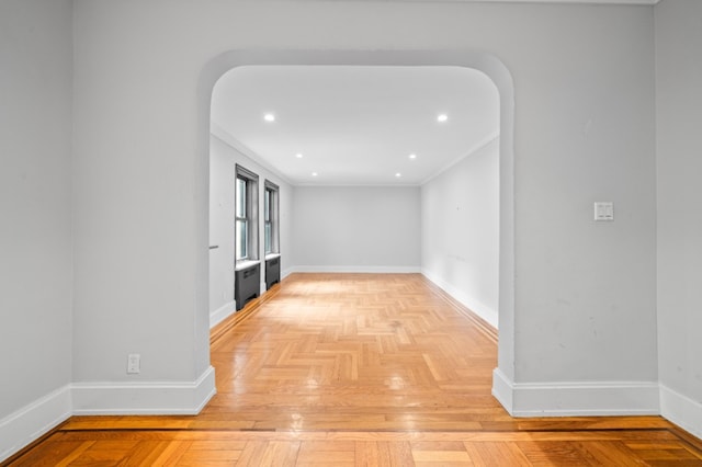 95 Park Ter E Unit 1D, New York City, NY 10034 - hallway featuring crown molding, recessed lighting, and arched walkways