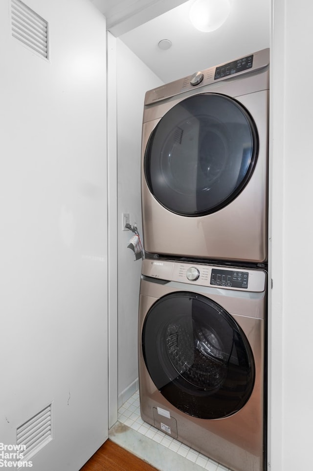 50 W 15th St Unit C1, New York City, NY 10011 - laundry room featuring estacked washer and dryer