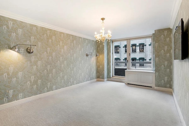 unfurnished dining area featuring a chandelier, carpet floors, ornamental molding, wallpapered walls, and baseboards