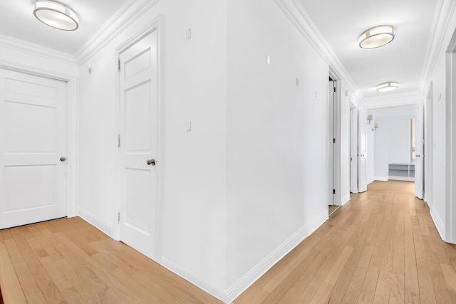170 E 87th St Unit E4A, New York City, NY 10028 - corridor with light wood finished floors, crown molding, and baseboards