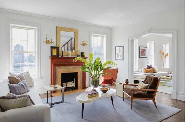 541 E 72nd St Unit 2/3, New York City, NY 10021 - living area with ornamental molding, wood finished floors, and a fireplace with flush hearth