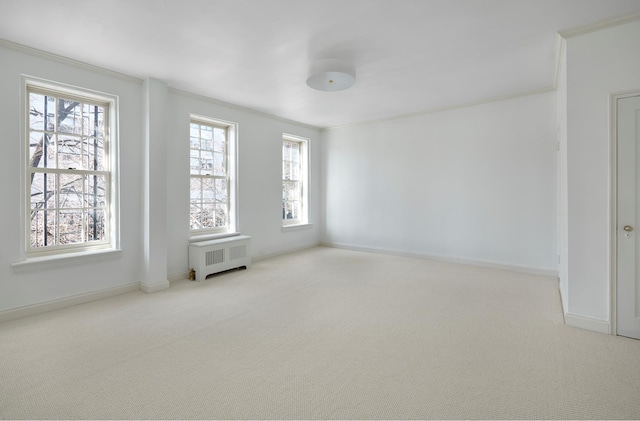 541 E 72nd St Unit 2/3, New York City, NY 10021 - carpeted spare room featuring radiator, ornamental molding, and baseboards