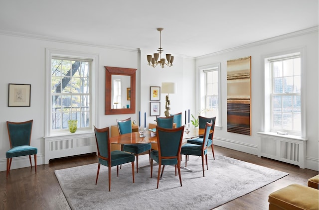 541 E 72nd St Unit 2/3, New York City, NY 10021 - dining area with radiator heating unit, ornamental molding, a chandelier, and wood finished floors
