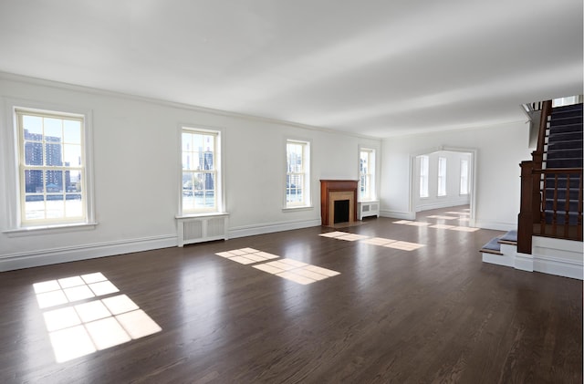 541 E 72nd St Unit 2/3, New York City, NY 10021 - unfurnished living room featuring stairway, ornamental molding, radiator, wood finished floors, and baseboards