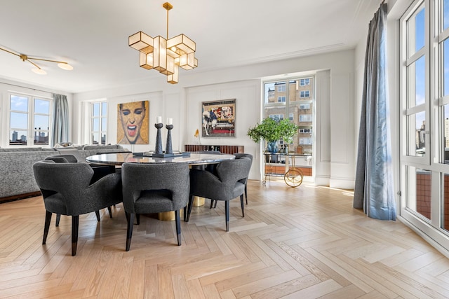 dining area featuring a chandelier