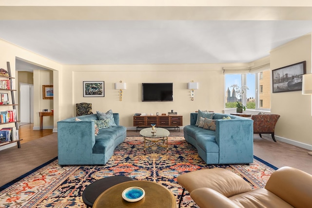 875 5th Ave Unit 12Ef, New York City, NY 10065 - carpeted living area featuring baseboards