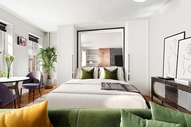bedroom featuring wood finished floors