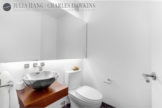 247 W 46th St Unit 2202, New York City, NY 10036 - half bathroom with toilet and vanity