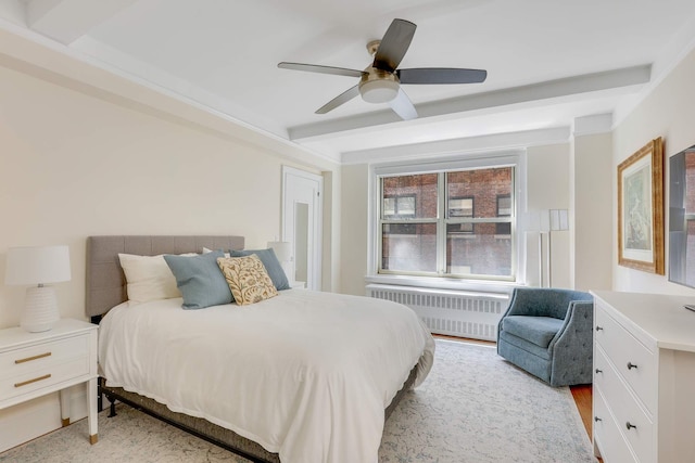 434 E 52nd St Unit 6D, New York City, NY 10022 - bedroom featuring radiator, ceiling fan, and beam ceiling