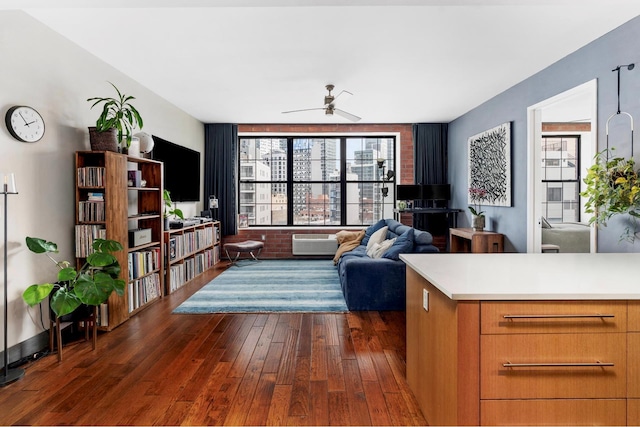 42-60 Crescent St Unit 7D, New York City, NY 11101 - living room with ceiling fan, dark wood-type flooring, a wall mounted air conditioner, and a wealth of natural light