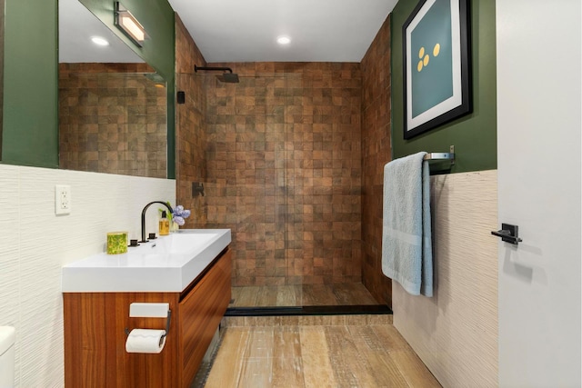 42-60 Crescent St Unit 7D, New York City, NY 11101 - bathroom with vanity, walk in shower, and recessed lighting