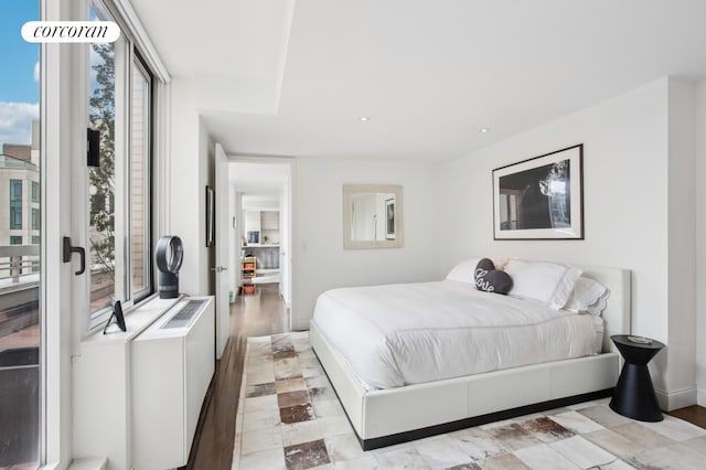 bedroom featuring recessed lighting and baseboards