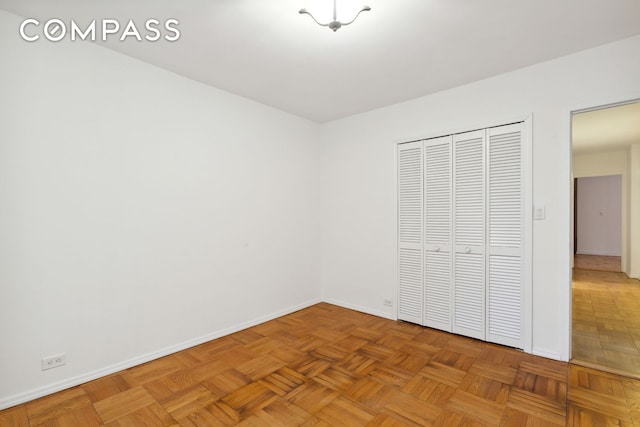 355 Clinton Ave Unit 1F, New York City, NY 11238 - unfurnished bedroom with baseboards and a closet