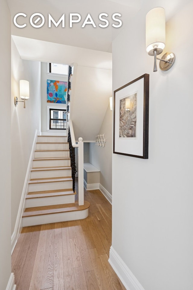 514 W End Ave Unit 8/9A, New York City, NY 10024 - stairway featuring wood finished floors and baseboards