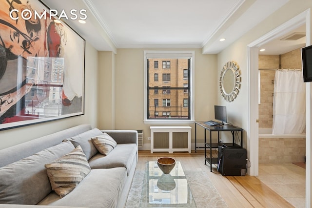 514 W End Ave Unit 8/9A, New York City, NY 10024 - living area featuring radiator, ornamental molding, wood finished floors, recessed lighting, and baseboards