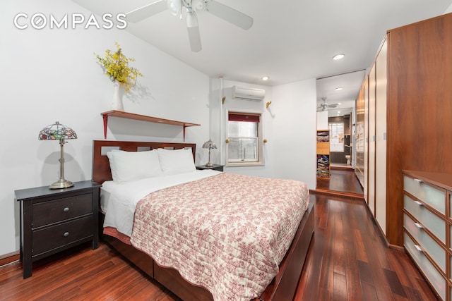 517 E 87th St Unit 1, New York City, NY 10128 - bedroom with a wall mounted air conditioner, dark wood-style floors, recessed lighting, and a ceiling fan