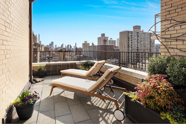 balcony featuring a city view