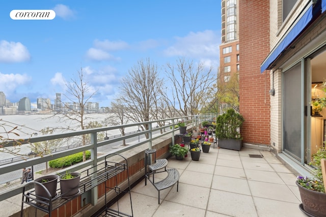 balcony featuring a view of city