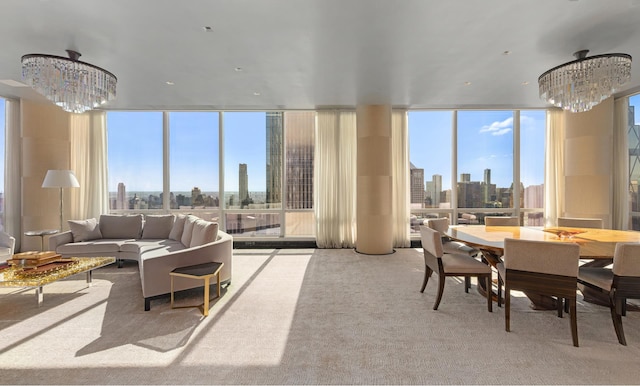interior space featuring carpet, a chandelier, and a wall of windows