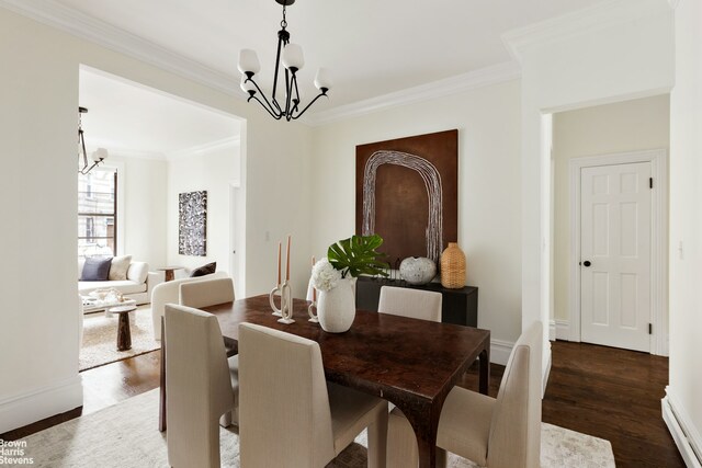 302 Weirfield St, New York City, NY 11237 - dining space featuring a chandelier, crown molding, wood finished floors, and baseboards