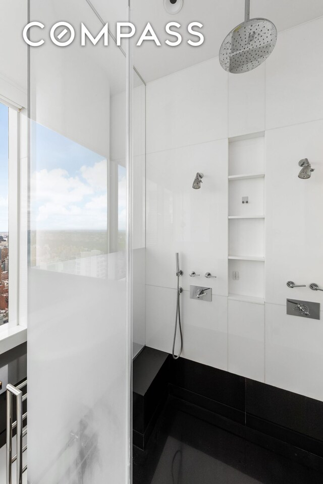 252 E 57th St Unit 60A, New York City, NY 10022 - full bath with tiled shower