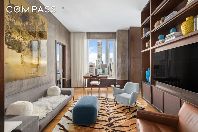 252 E 57th St Unit 60A, New York City, NY 10022 - living area with light wood-style floors