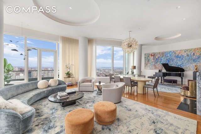 252 E 57th St Unit 60A, New York City, NY 10022 - living room with wood finished floors