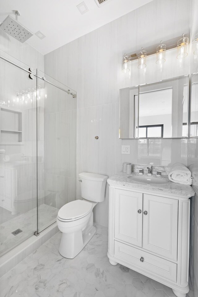 112 Luquer St Unit 2, New York City, NY 11231 - full bath with toilet, a stall shower, vanity, and marble finish floors