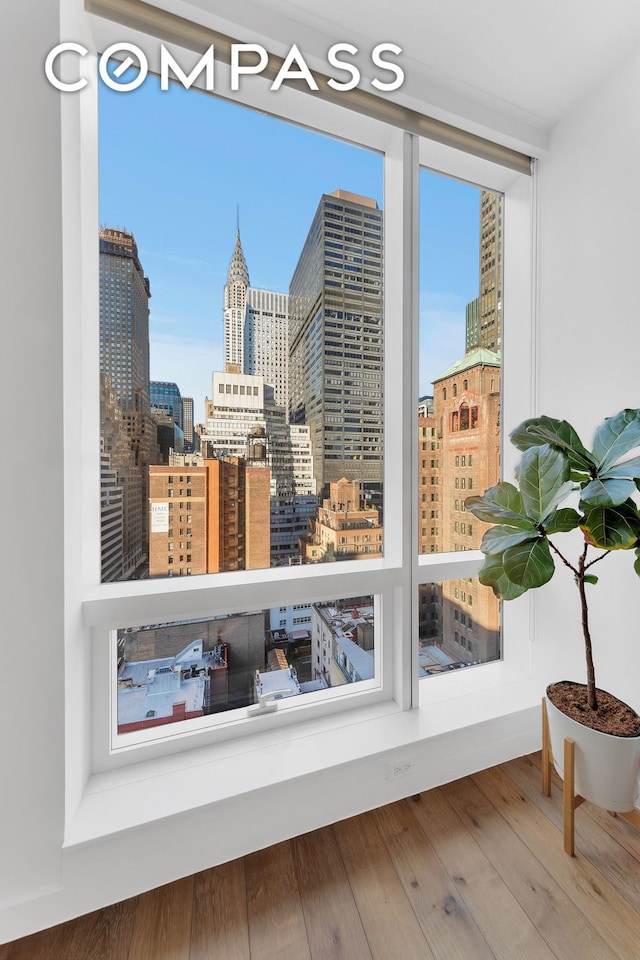 325 Lexington Ave Unit 16C, New York City, NY 10016 - detailed view of wood finished floors and a city view
