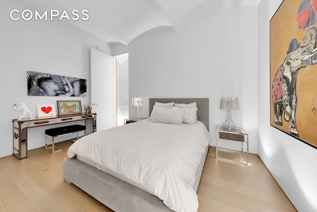 bedroom with light wood-style flooring