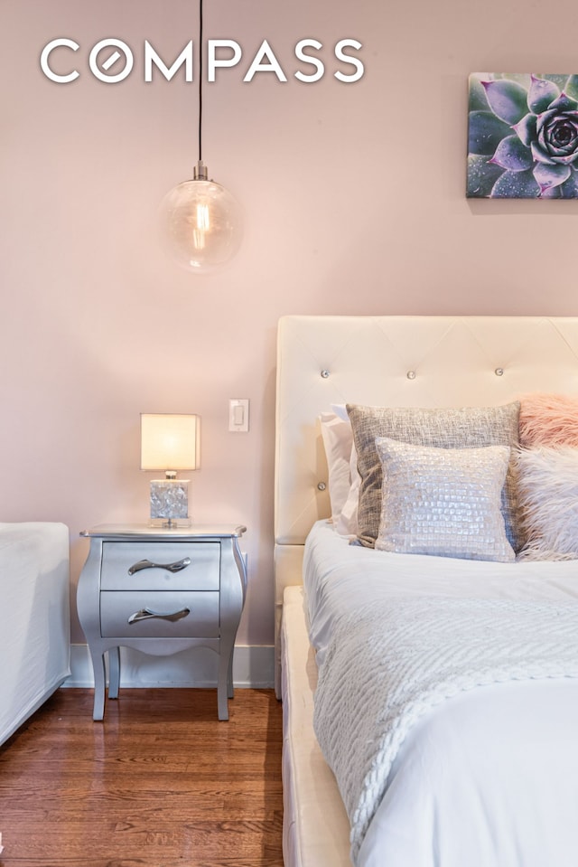 61 Oliver St Unit 4P, New York City, NY 11209 - bedroom with wood finished floors and baseboards