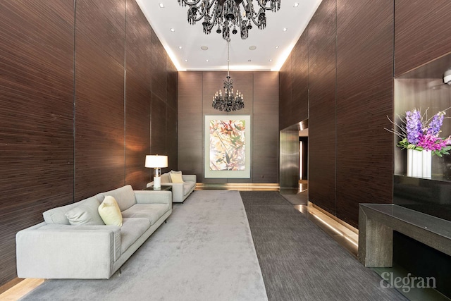 common area with a high ceiling and recessed lighting