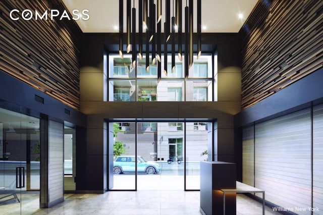 community lobby with a towering ceiling