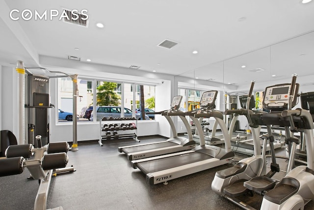gym with recessed lighting and baseboards
