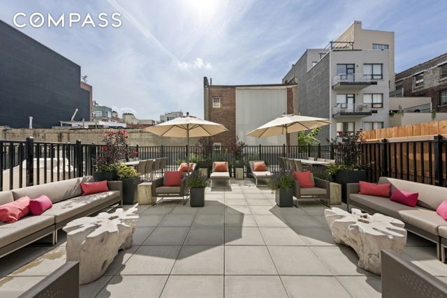 view of patio / terrace with outdoor lounge area and fence